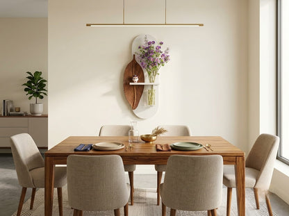 Wooden leaf wall art with glass vase styled in a modern bedroom