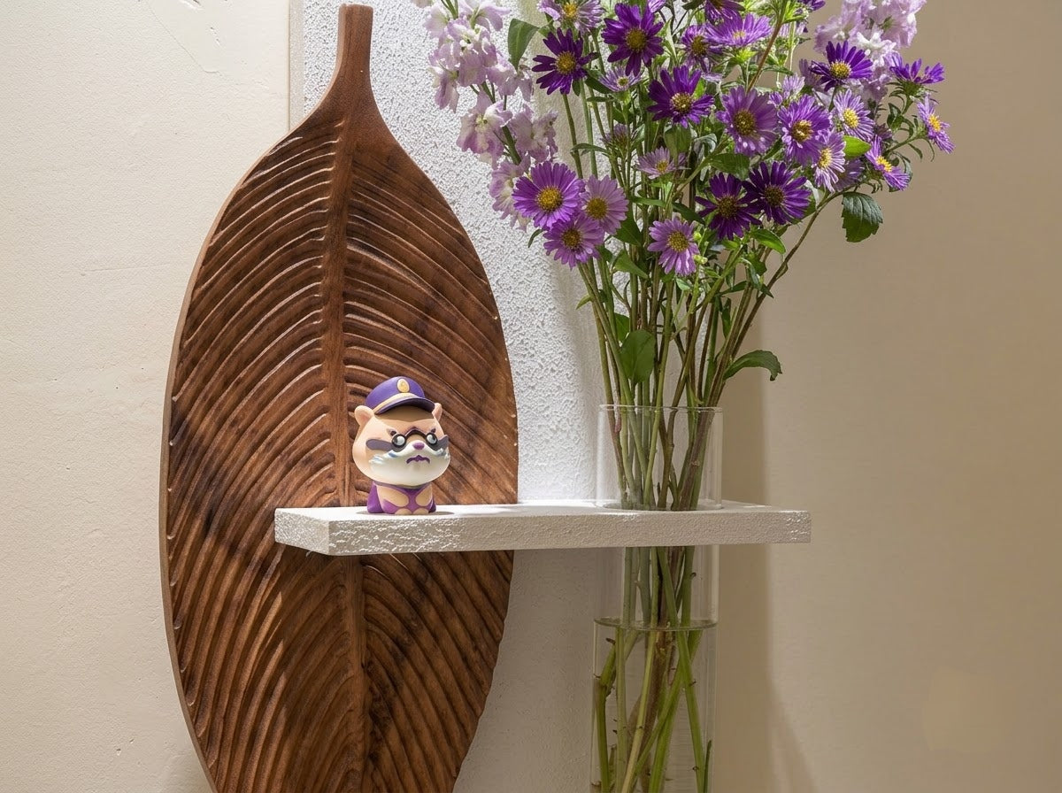Minimal wooden leaf wall art with floating shelf and clean oval back panel