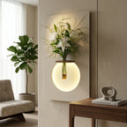 LED wall art globe flower vase lamp mounted in modern living room – warm ambient glow India