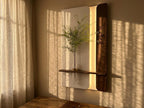 Modern wooden LED wall art installed in living room interior with warm ambient lighting and minimalist decor style