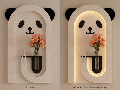 A panda-shaped wall sconce shown in two side-by-side views: LED OFF on the left and LED ON (3000K Warm White) on the right. The sconce has a textured light beige stone-like finish with black panda ears, eyes, and nose, and a warm glowing arched backlit frame.